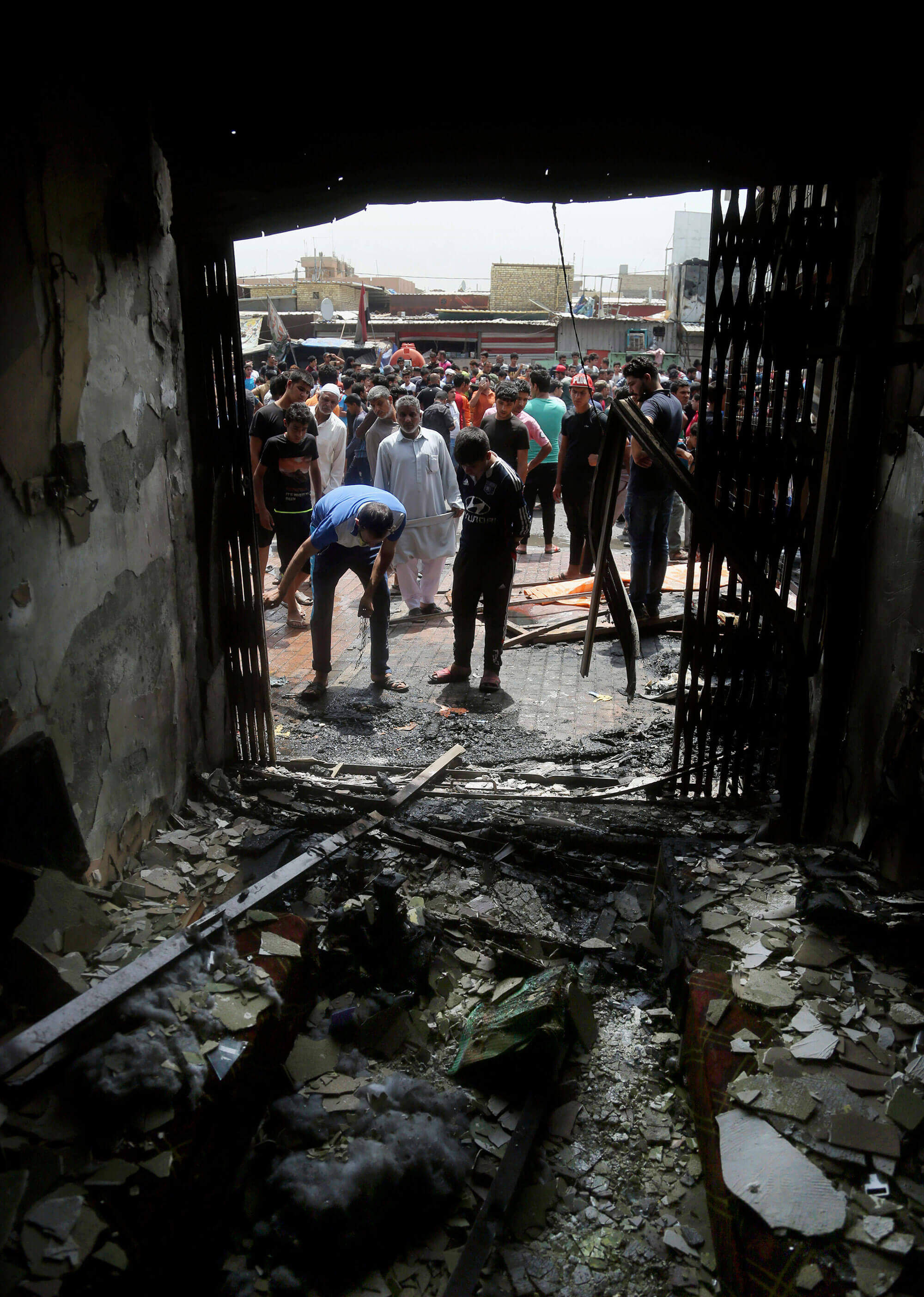Picture of destroyed storefront after the marketplace car bombing in Baghdad, Iraq. 