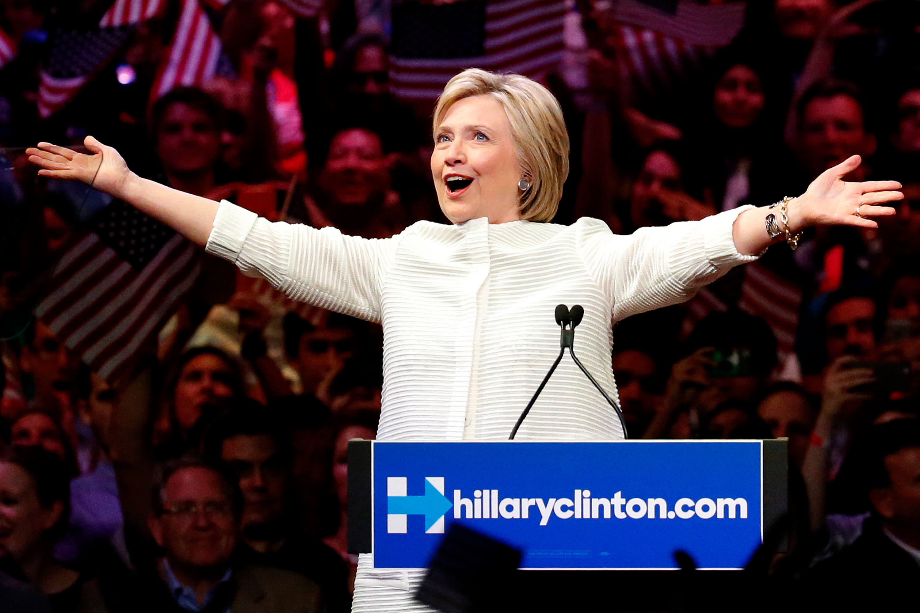 image of Hillary Clinton greeting supporters at a presidential primary election night rally