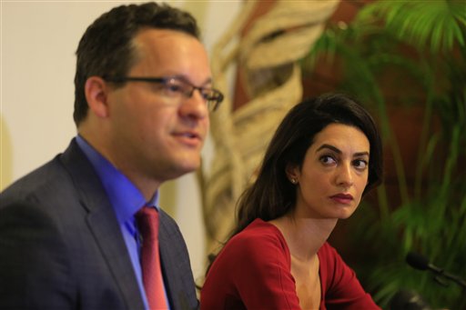 human rights attorneys Jared Genser and Amal Clooney