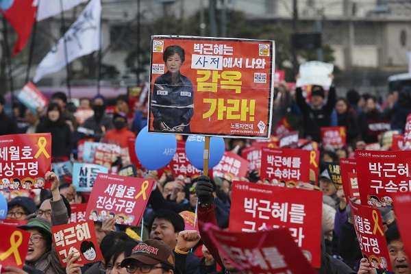 Protestors Call for Ousted President's Arrest