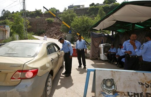 Pakistani police search cars