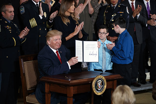 President Trump with the signed declaration