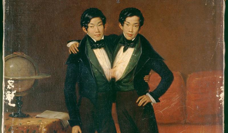 The original Siamese twins, Eng and Chang, arrived in Boston.