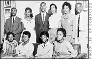 The Little Rock Nine pictured with Daisy Bates, the president of the Arkansas NAACP.
