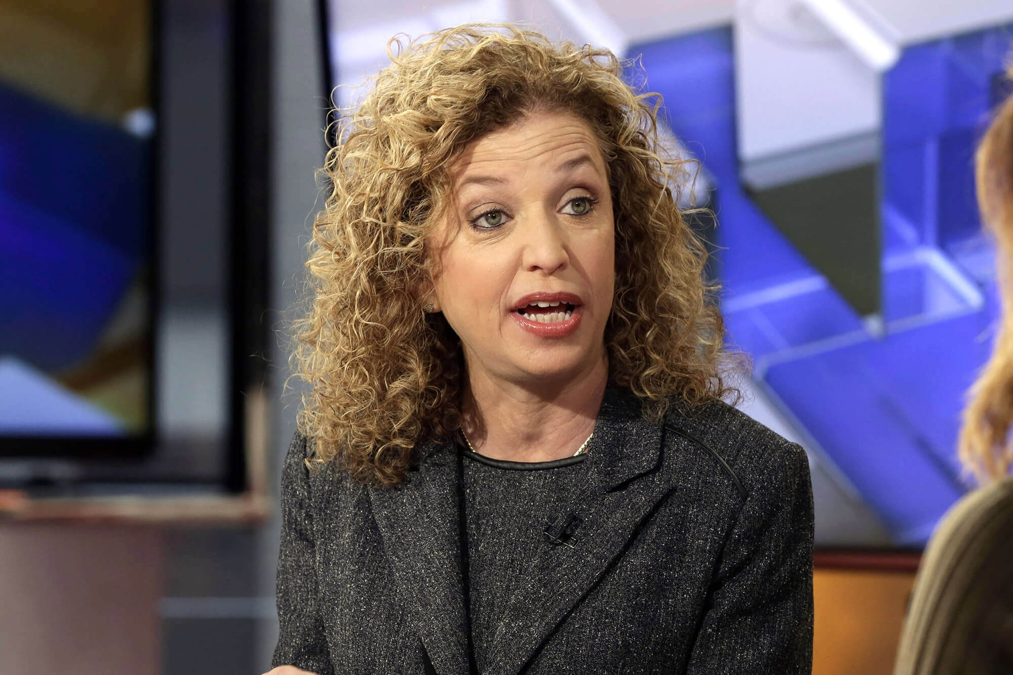 Image of the then-Democratic National Committee (DNC) Chair Rep. Debbie Wasserman Schultz being interviewed
