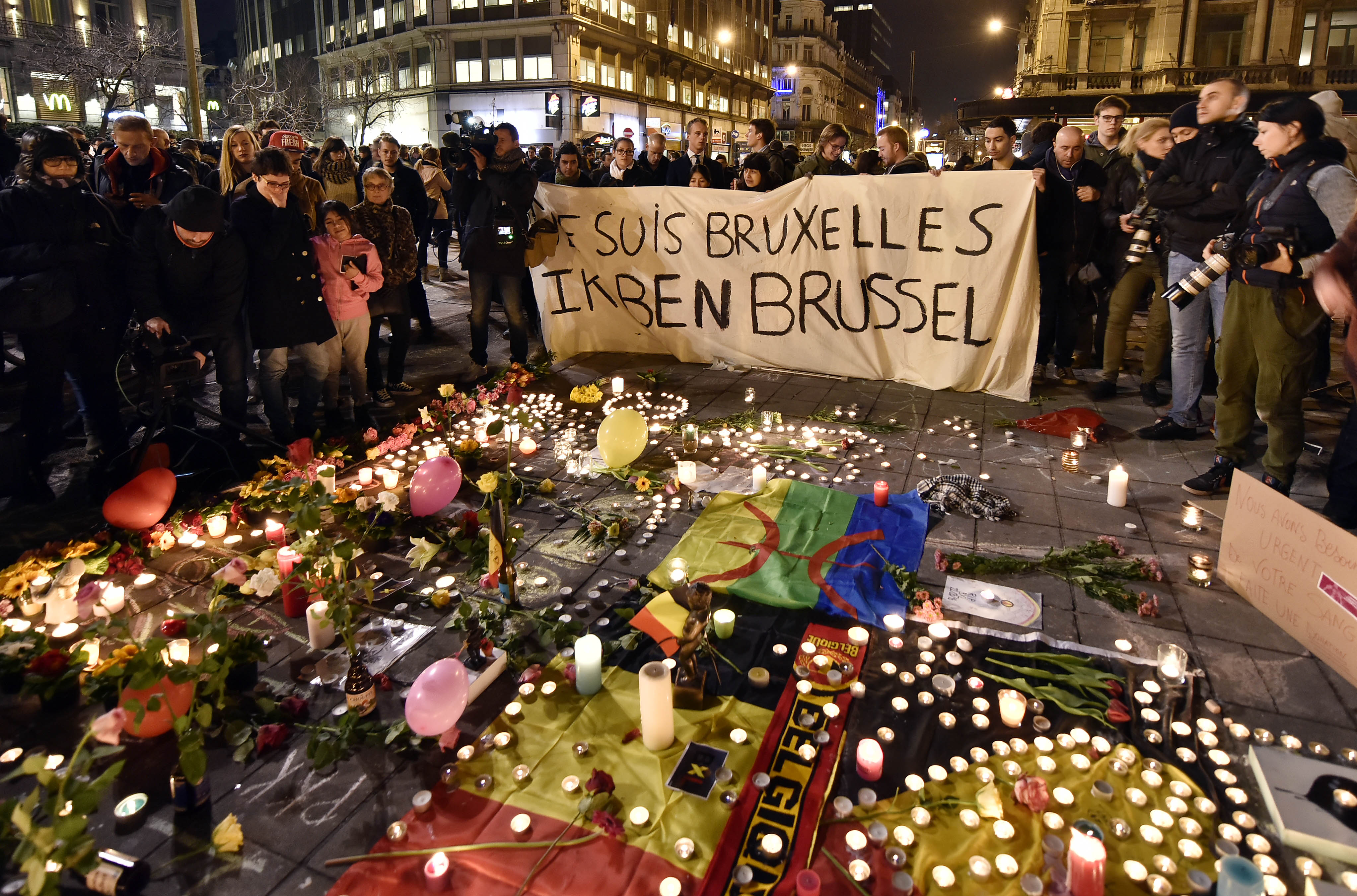 mourners at the scene of the brussels terrorist attacks