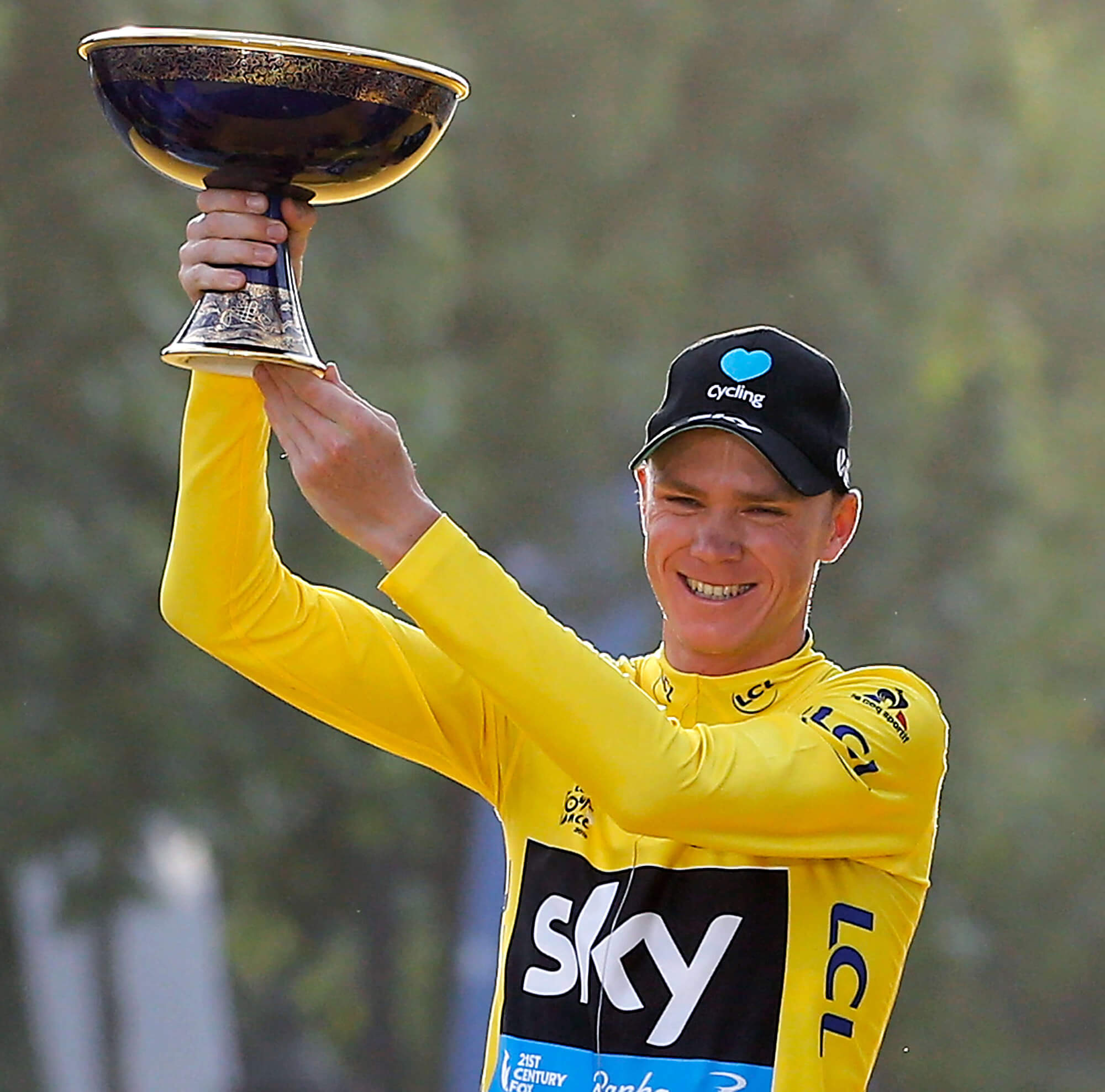 Image of Chris Froome with Tour de France trophy