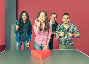 image of college students playing beer pong