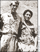 Sir Edmund Hillary poses with Sherpa climber Tenzing Norgay at Everest base.