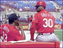 Ken Griffey Sr. sits with his son, Ken Griffey Jr.