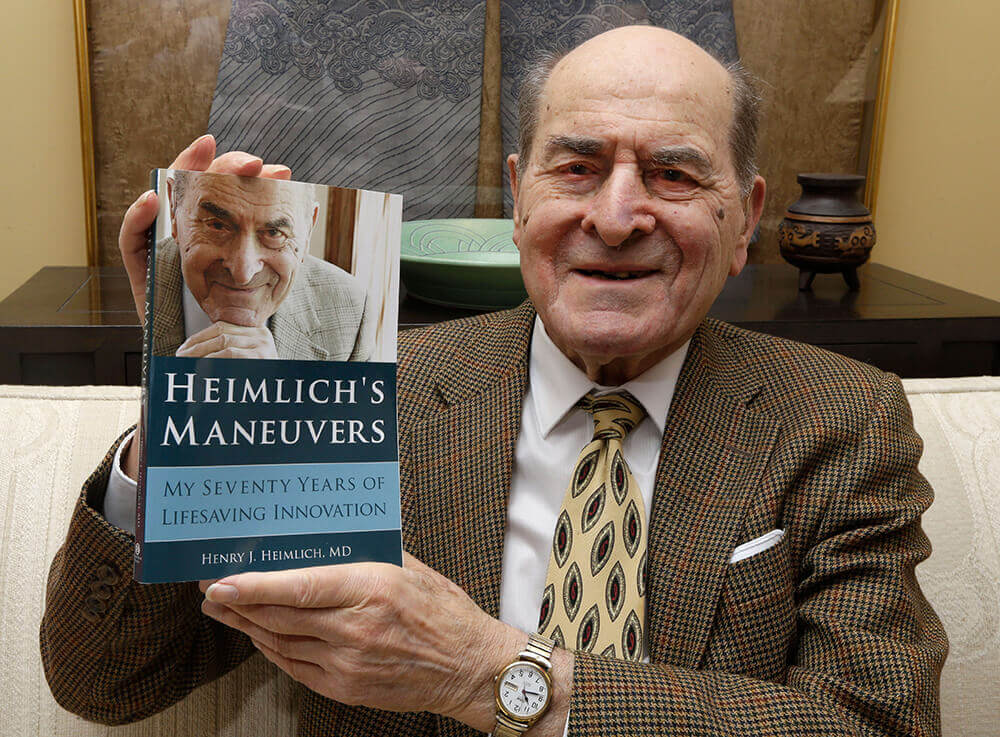 Image of Heimlich with his book