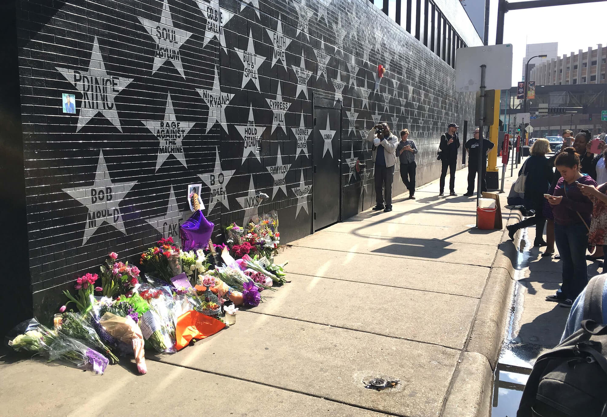 First Avenue lined with flowers to create a memorial to the artist Prince