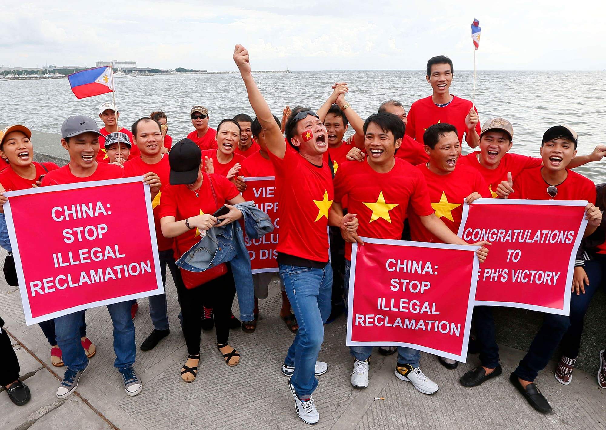Image of protestors protesting china's attempt to reclaim the sea