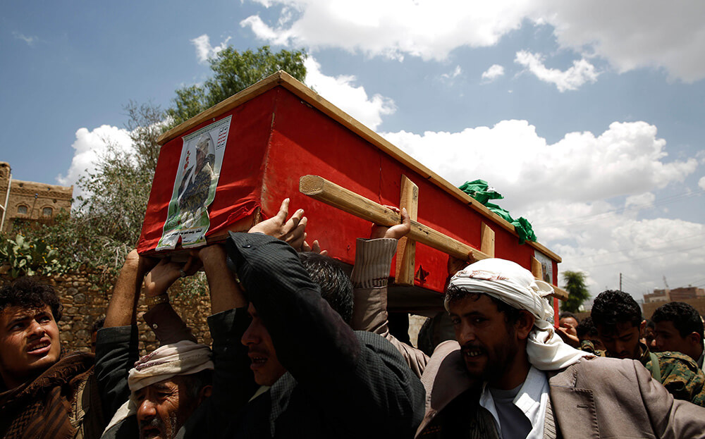 a fellow Houthi is laid to rest in Yemen