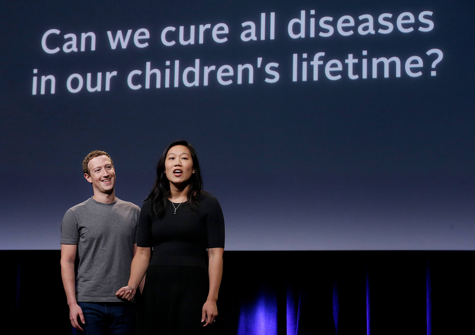 Image of Zuckerberg with his wife Priscilla Chan