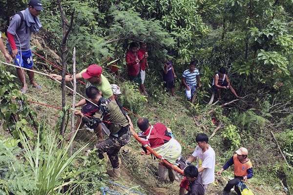 The Local Red Cross Helps Survivors Out of Ravine
