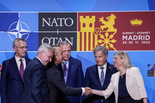NATO and Putin clash over military increase
