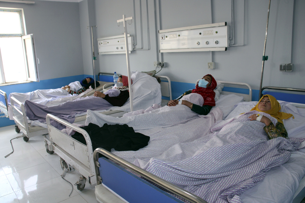 Afghan schoolgirls receive treatment for suspected poisoning, at a hospital in Sar-e-Pul province in northern, Afghanistan, Monday, June 5, 2023.