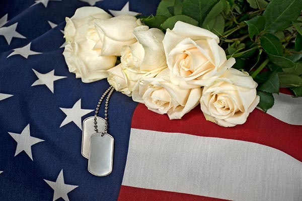Military Dog Tags with White Roses and the American Flag