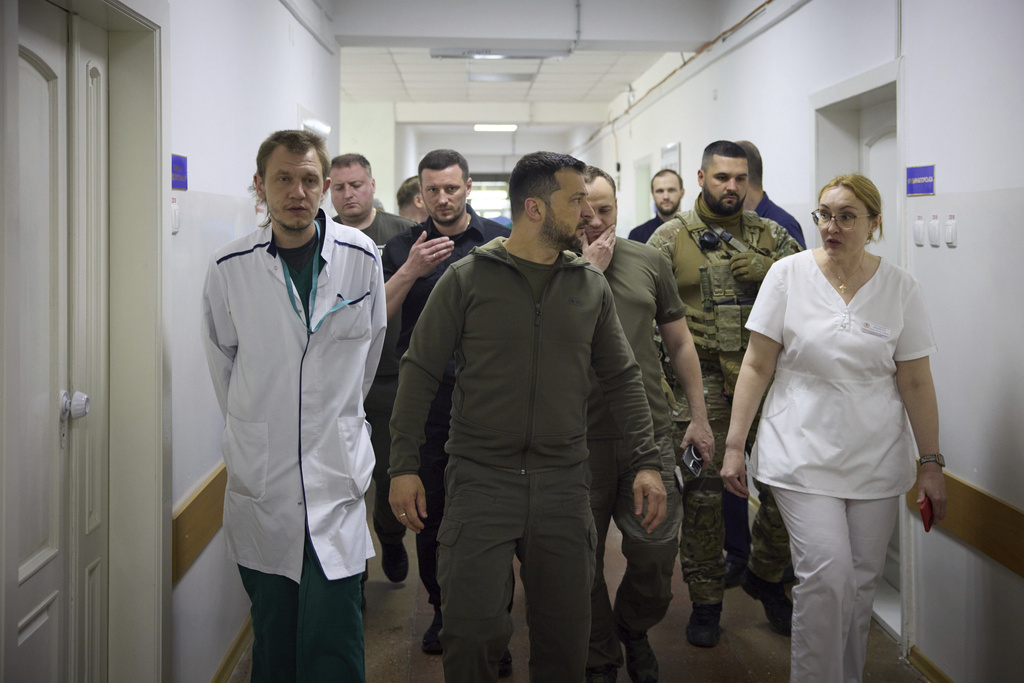 Ukrainian President Volodymyr Zelenskyy visits a city hospital