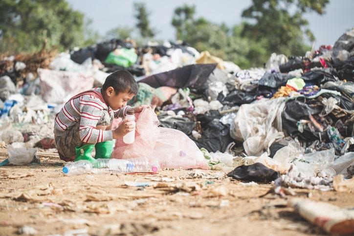 Child picking garbage