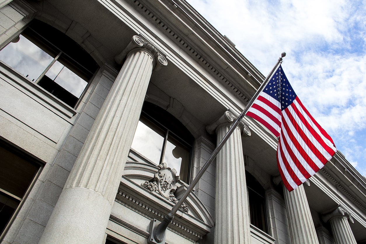 American flag flying over courthouse