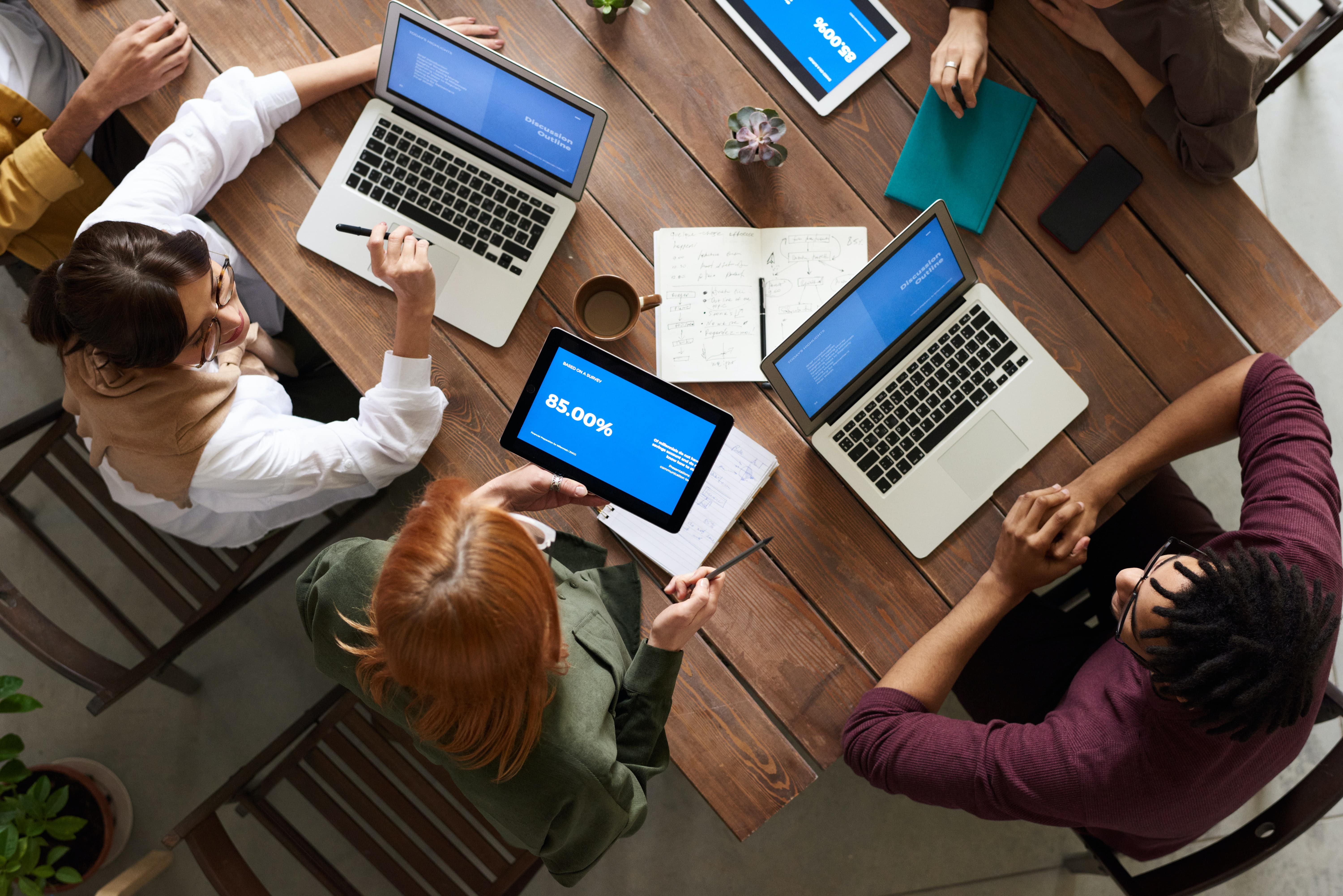 People around a laptop