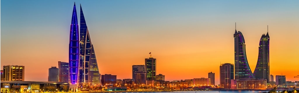   Search by image or video Skyline of Manama at sunset
