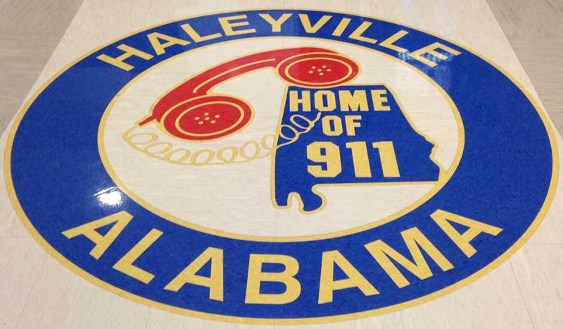 The country's first 911 phone system went into service in Haleyville, Ala.