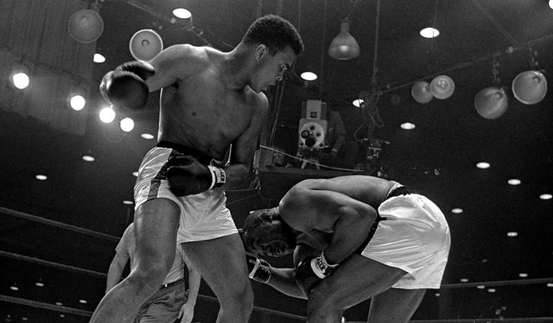 Cassius Clay (Muhammad Ali) became world heavyweight boxing champion for the first time by knocking 