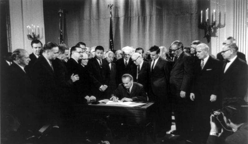 President Lyndon B. Johnson signed the 1968 Civil Rights Act.