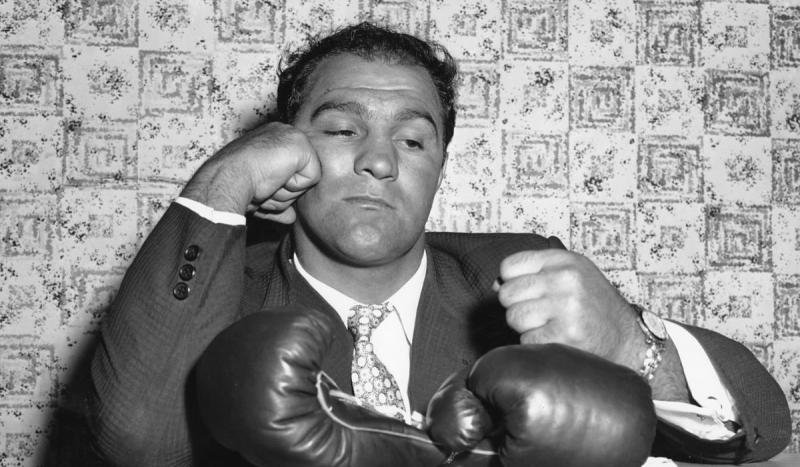 Rocky Marciano retired as undefeated world heavyweight boxing champion.
