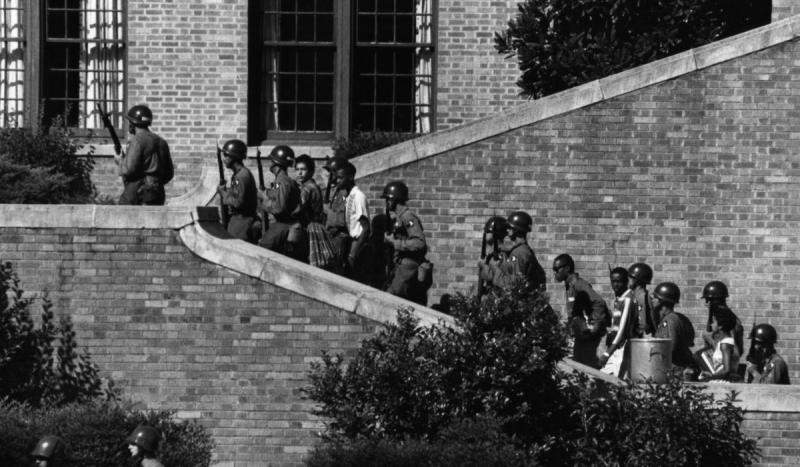 Nine black students attempted to enter Little Rock's Central High School but were blocked by the Nat