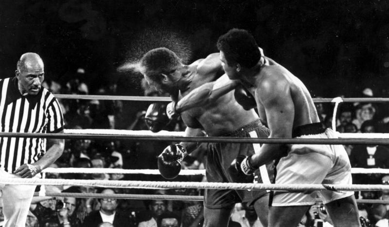 Muhammad Ali knocked out George Foreman in the eighth round of a 15-round bout in Kinshasa, Zaire ("