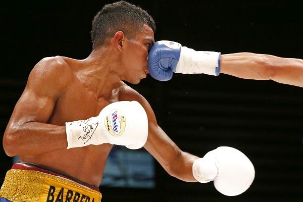 Barrera takes a punch to the face