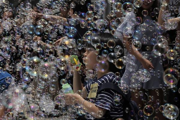Children in Hong Kong Delighted by Bubbles